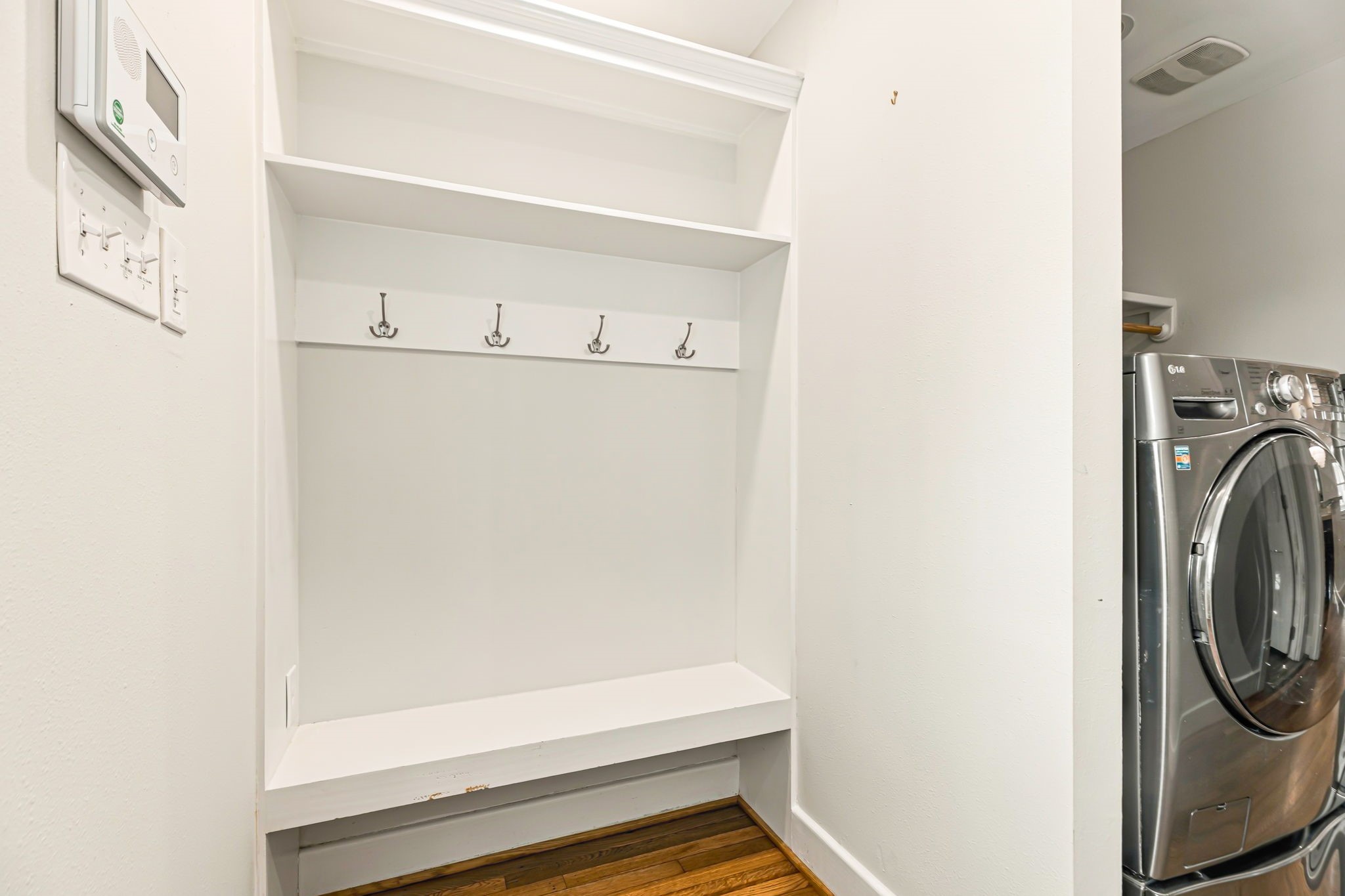 Mud  room drop just inside as you enter from the backyard.