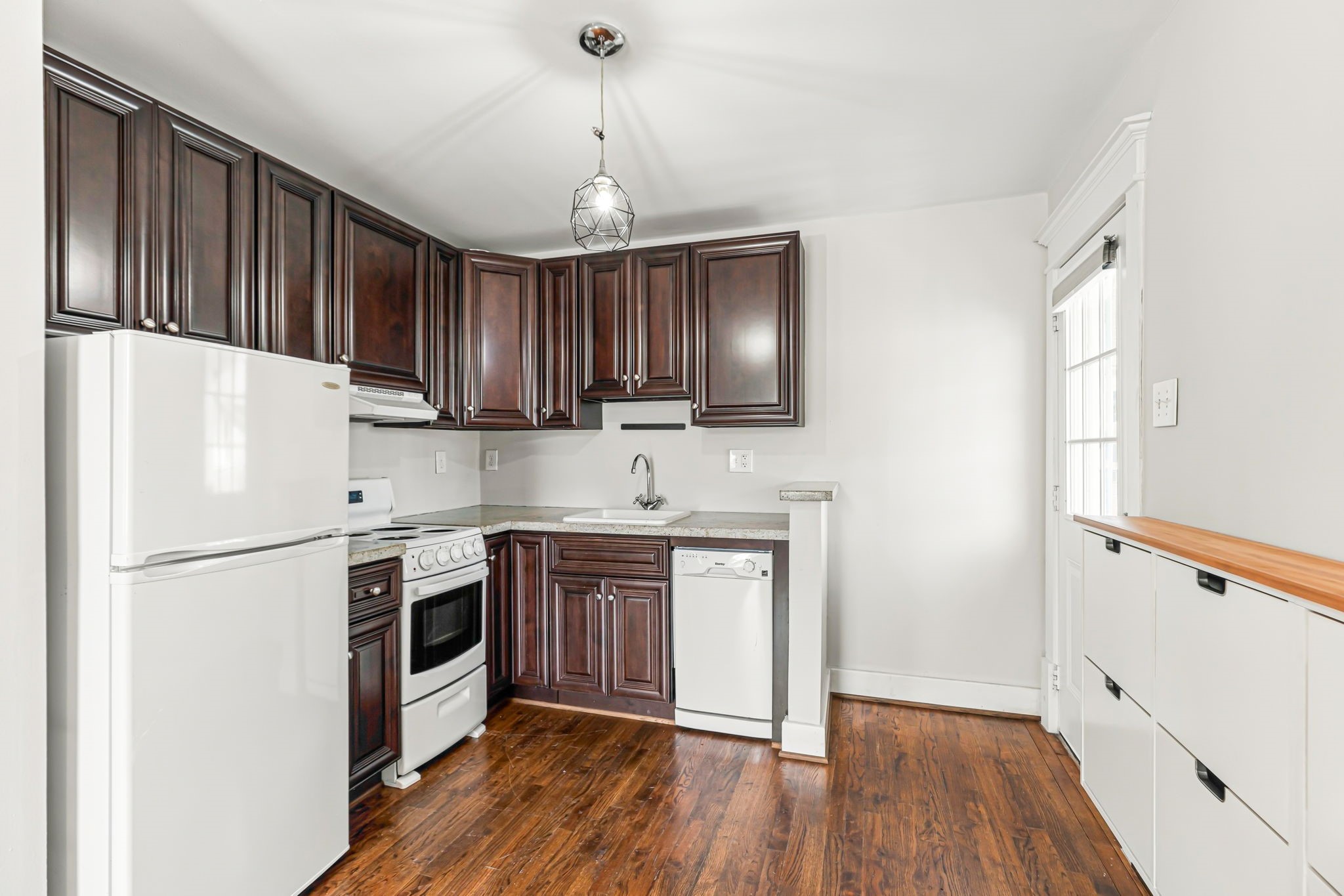 Garage apartment with full kitchen.