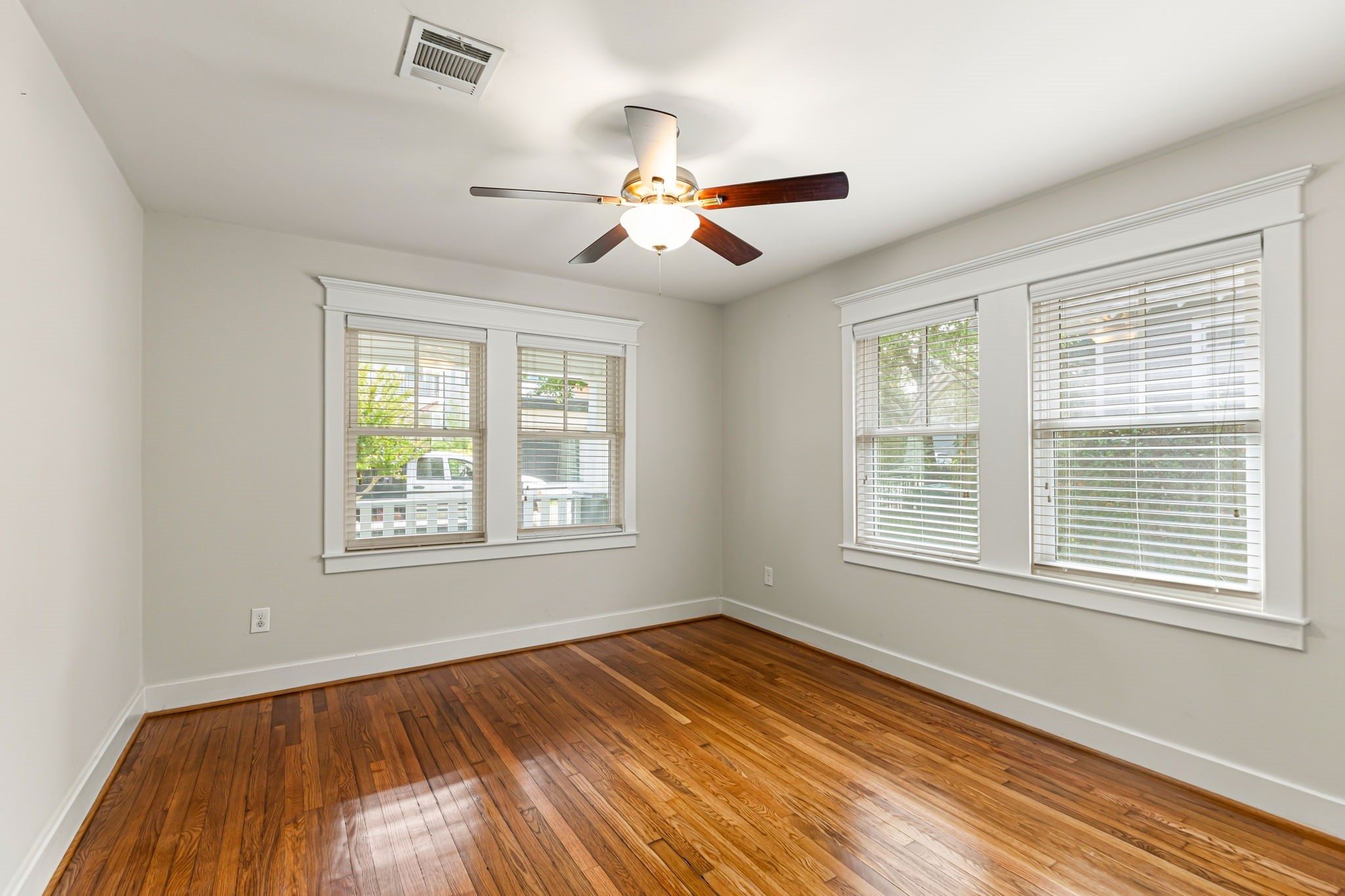 One of the two secondary bedrooms.  This one has a nice views to the front porch.