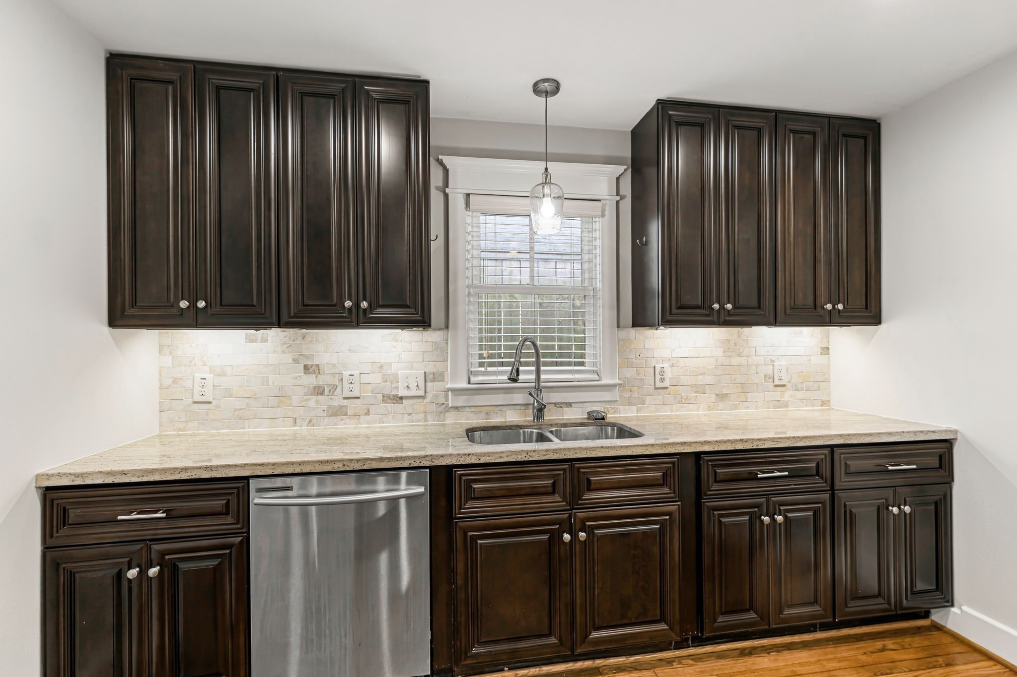 Kitchen offers so much counter and cabinet space.
