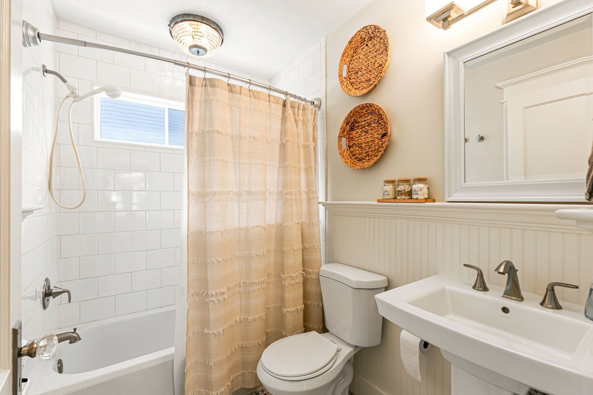Nice secondary bathroom is between the two secondary bedrooms in the main house.