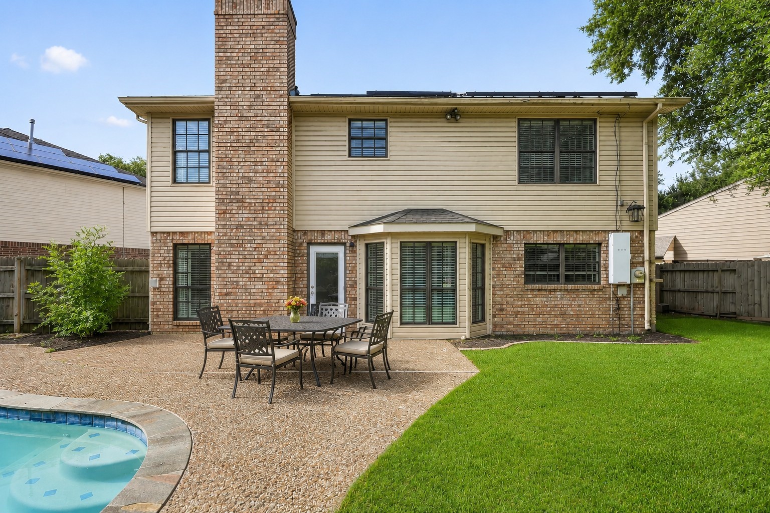 Virtually Cleaned: A generous patio provides room for outdoor seating and entertaining.