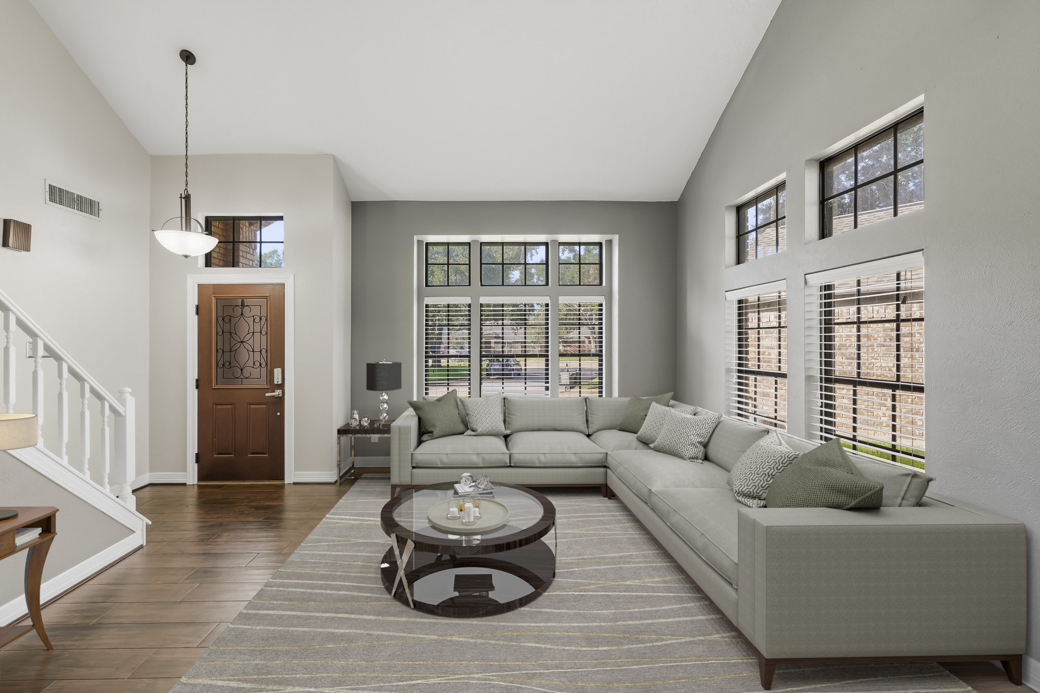 Virtually Staged: The open living room provides plenty of room for a generous seating arrangement, while the neutral finishes create a bright, versatile space ideal for relaxing or entertaining.