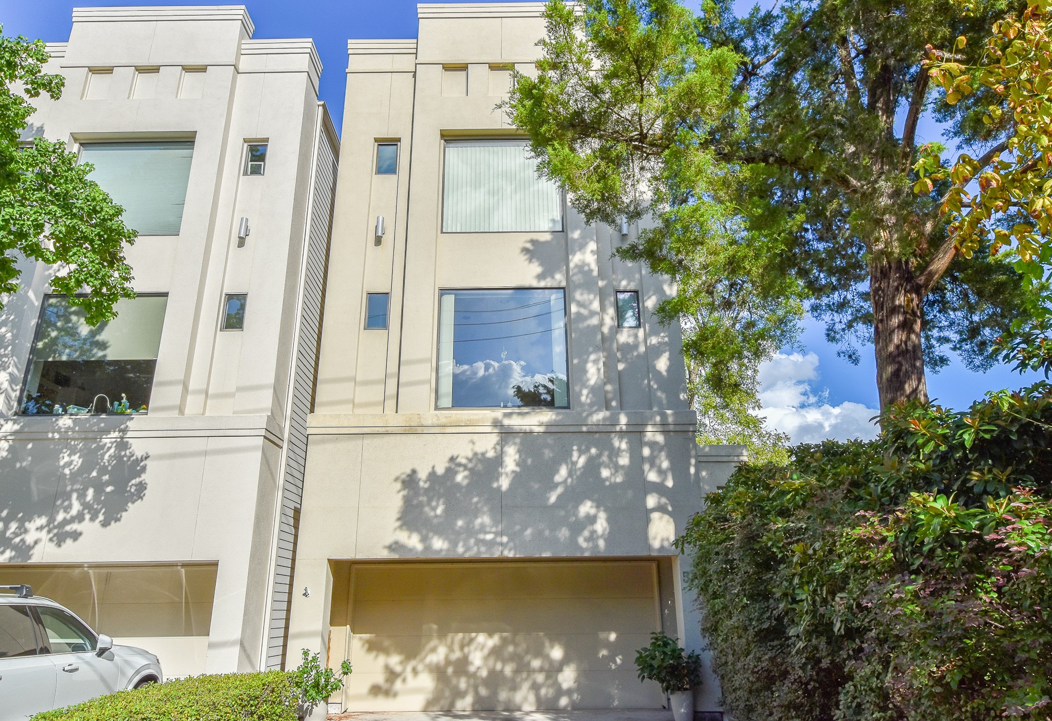 Modern tri-level patio home located in the heart of Rice Military... Garage & 2 car parking driveway