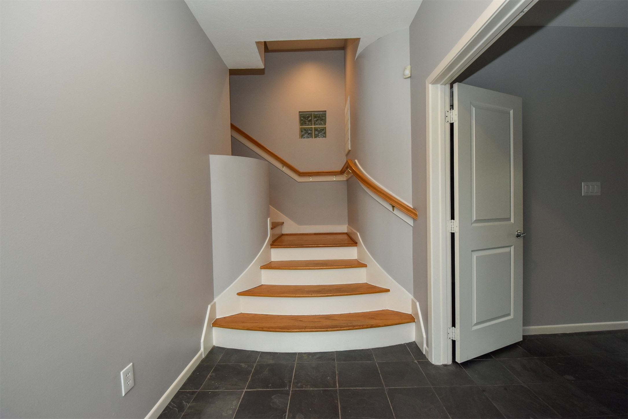 Entry leads to the downstairs flex room/bedroom Entry leads to the downstairs flex room/bedroom