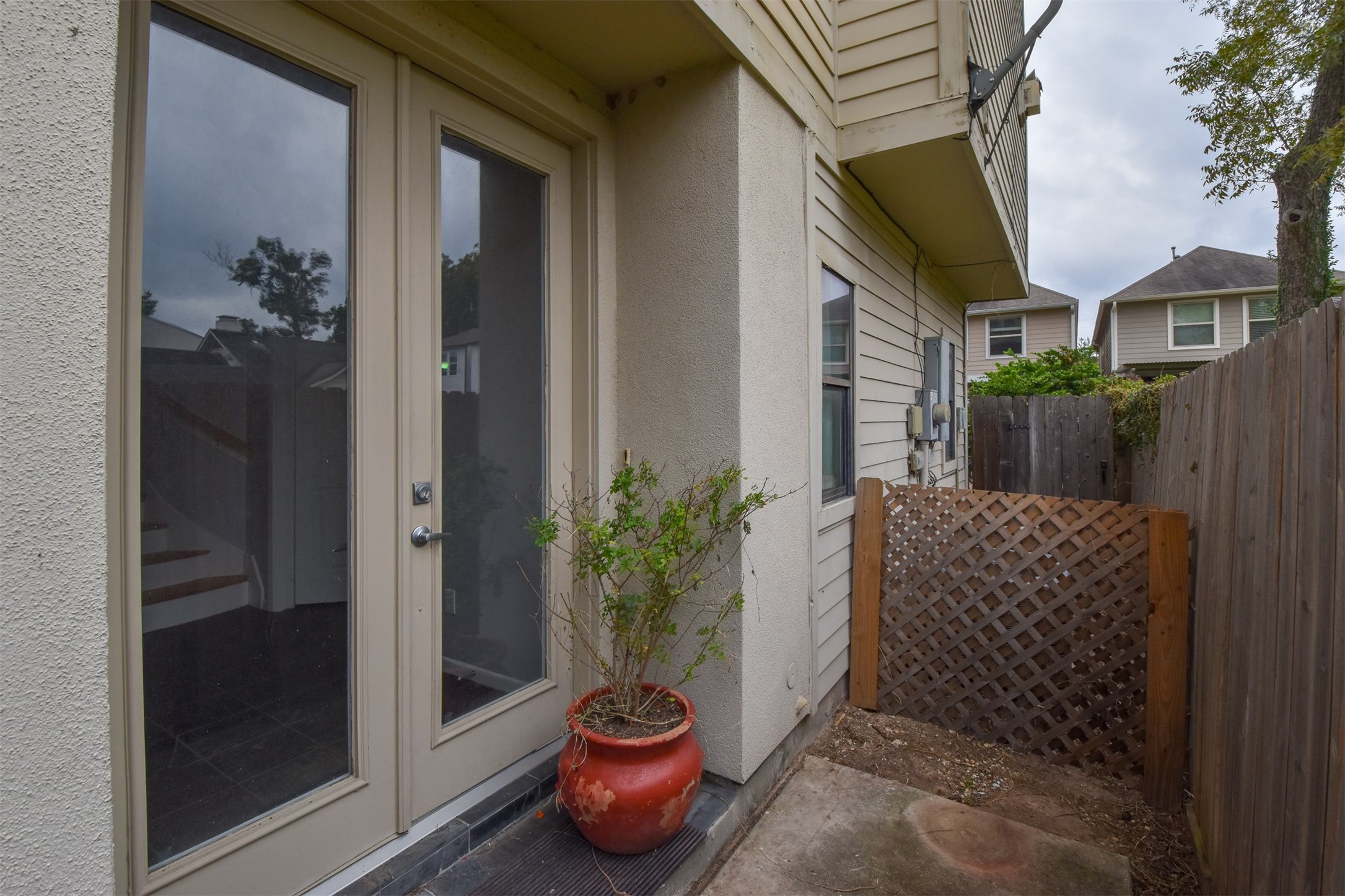 Gated entry & sidewalk leads to the front door entry Gated entry & sidewalk leads to the front door entry