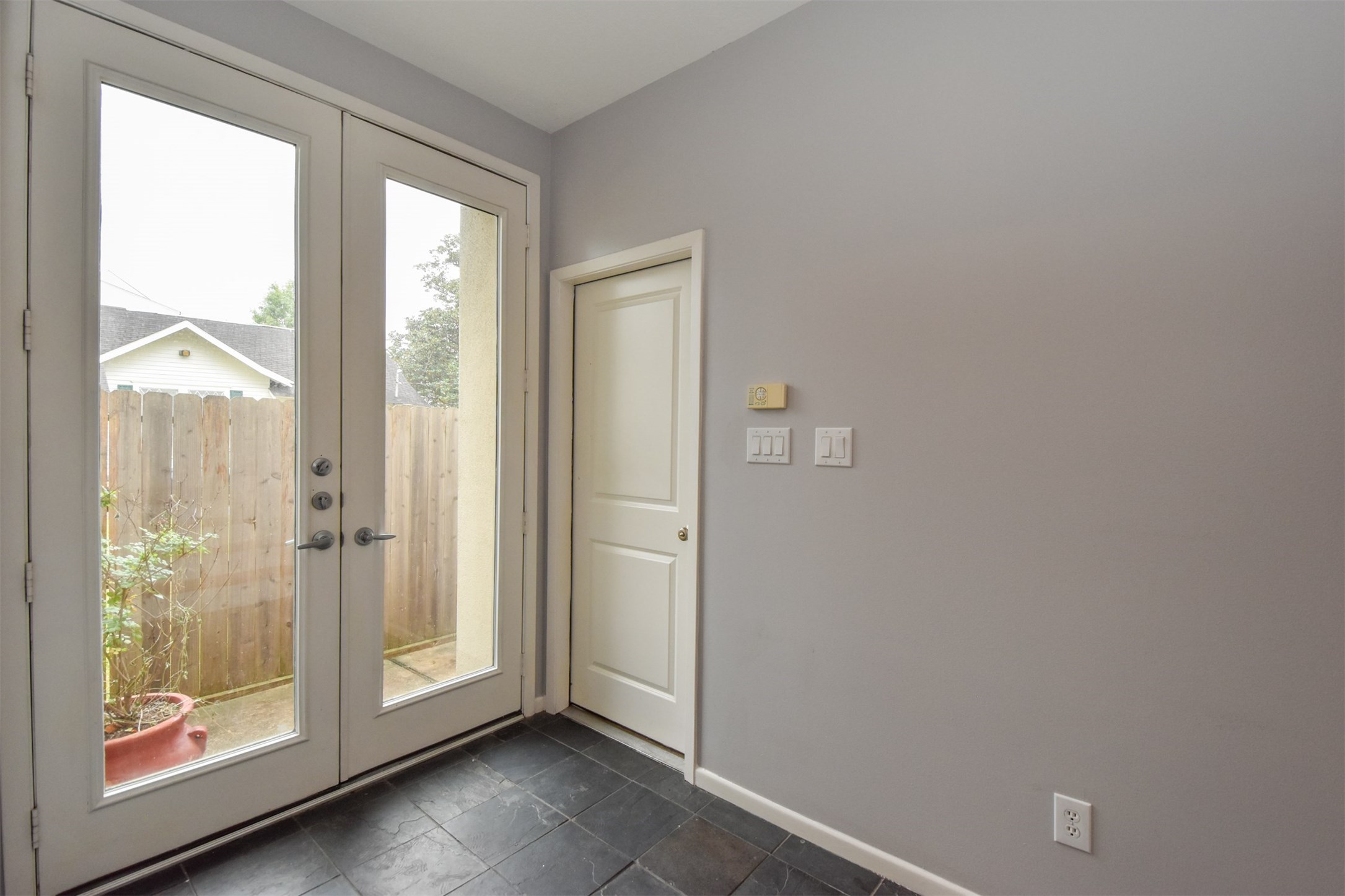 Front entry with slate tile floors Front entry with slate tile floors