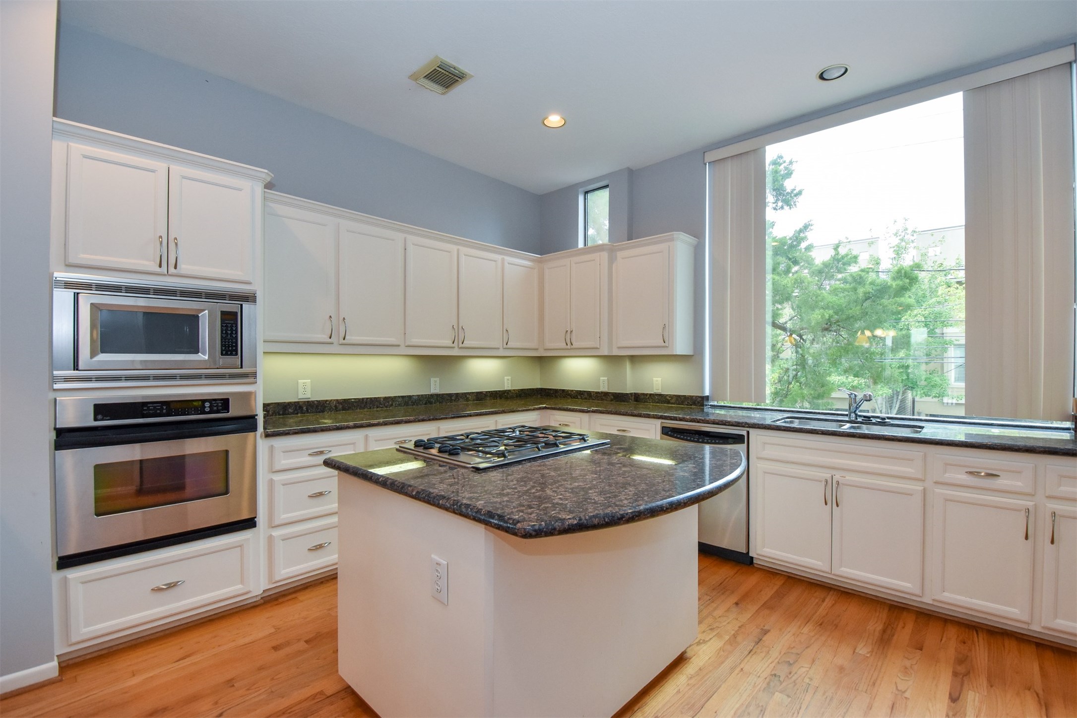 Kitchen loaded with cabinetes and storage...