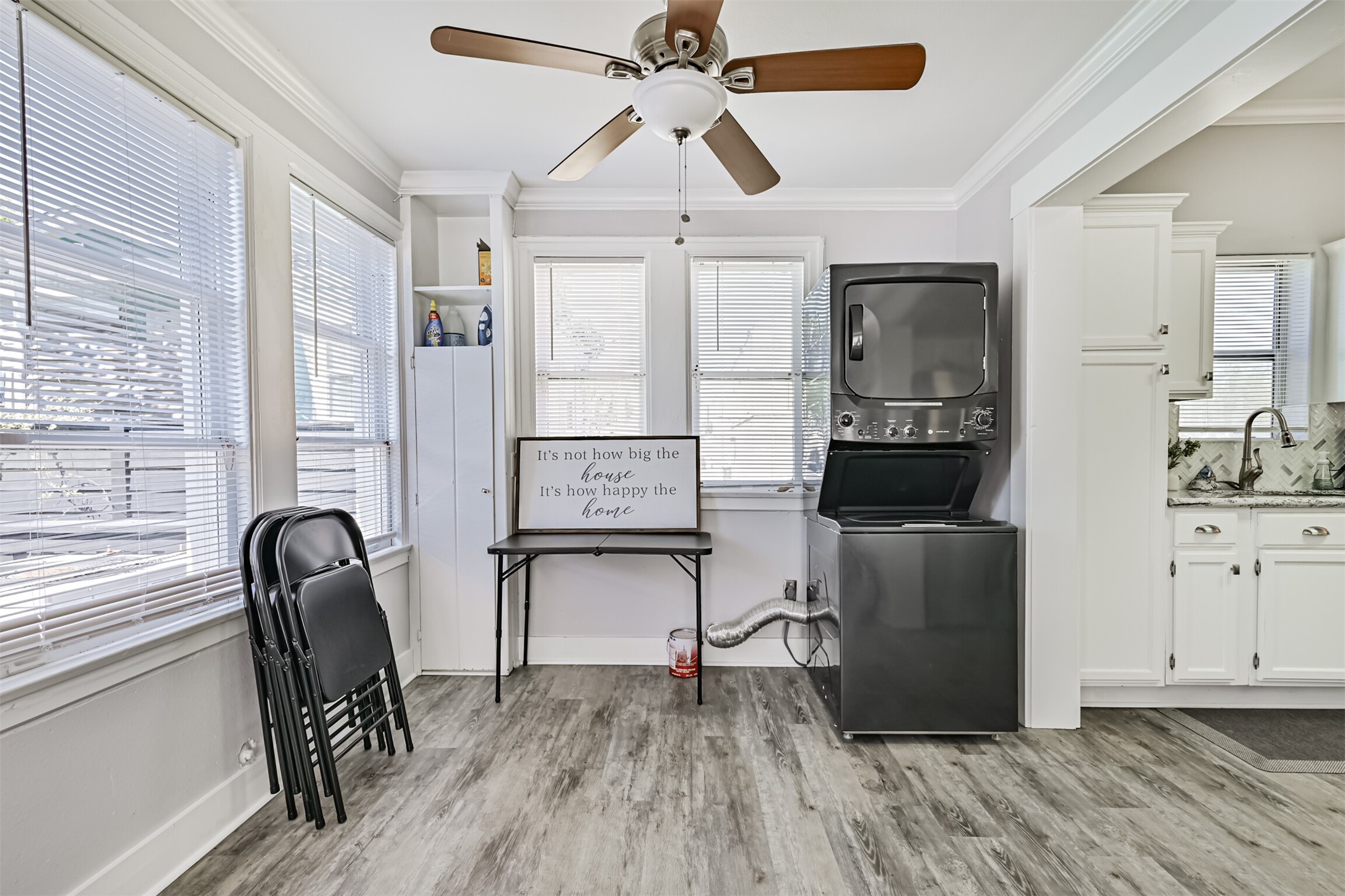 Located Just Off the Kitchen is a Large, Additional Den at the Rear of the Home with Laundry Area.