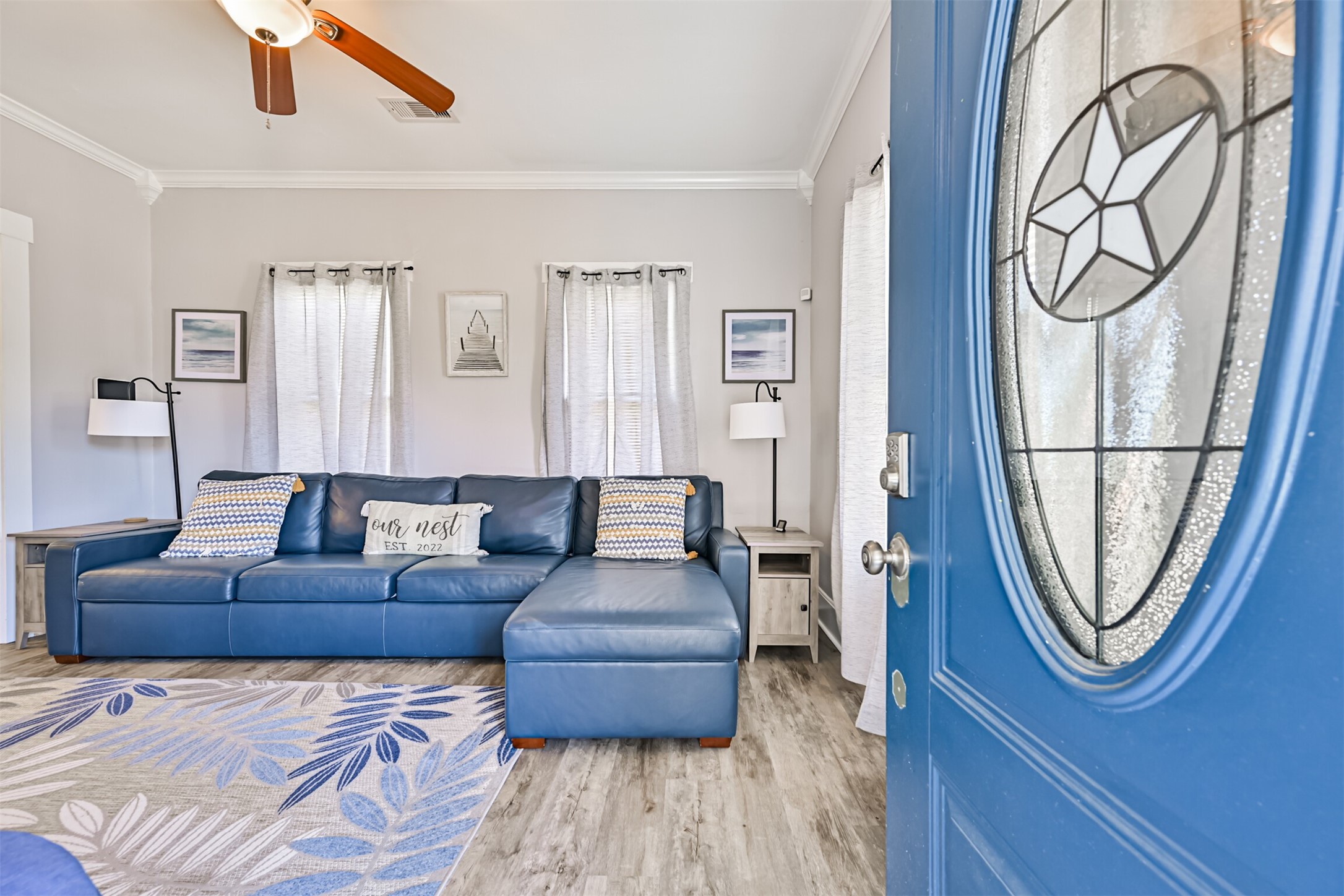 Walking Through the Front Door - a Nicely Sized Living Room with Space for Entertaining! Beachy Inspired Upgrades Throughout the Home!