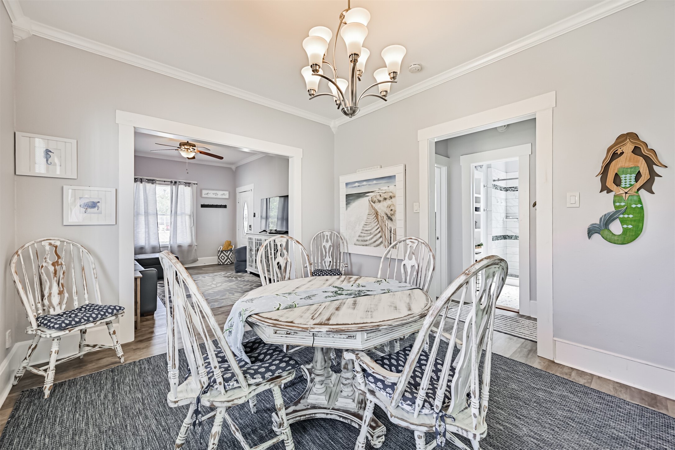 This Angle Shows the Relationship Between the Dining and Living Rooms, With a Peek into the Hall Area with the Bathroom and Two Bedrooms!