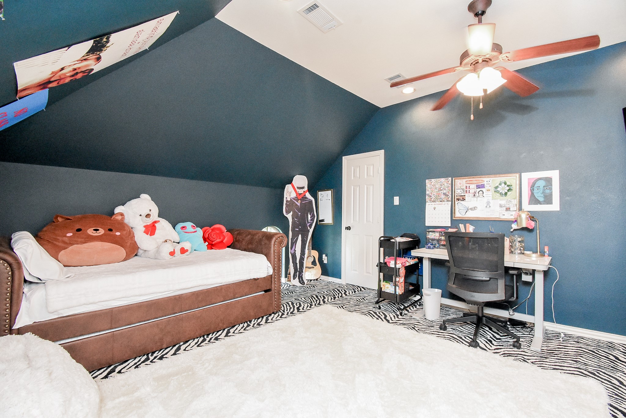 The bookcase in bedroom one opens into the upstairs secret room. Any kids dream. This space is awesome for additional sleeping areas and play.
