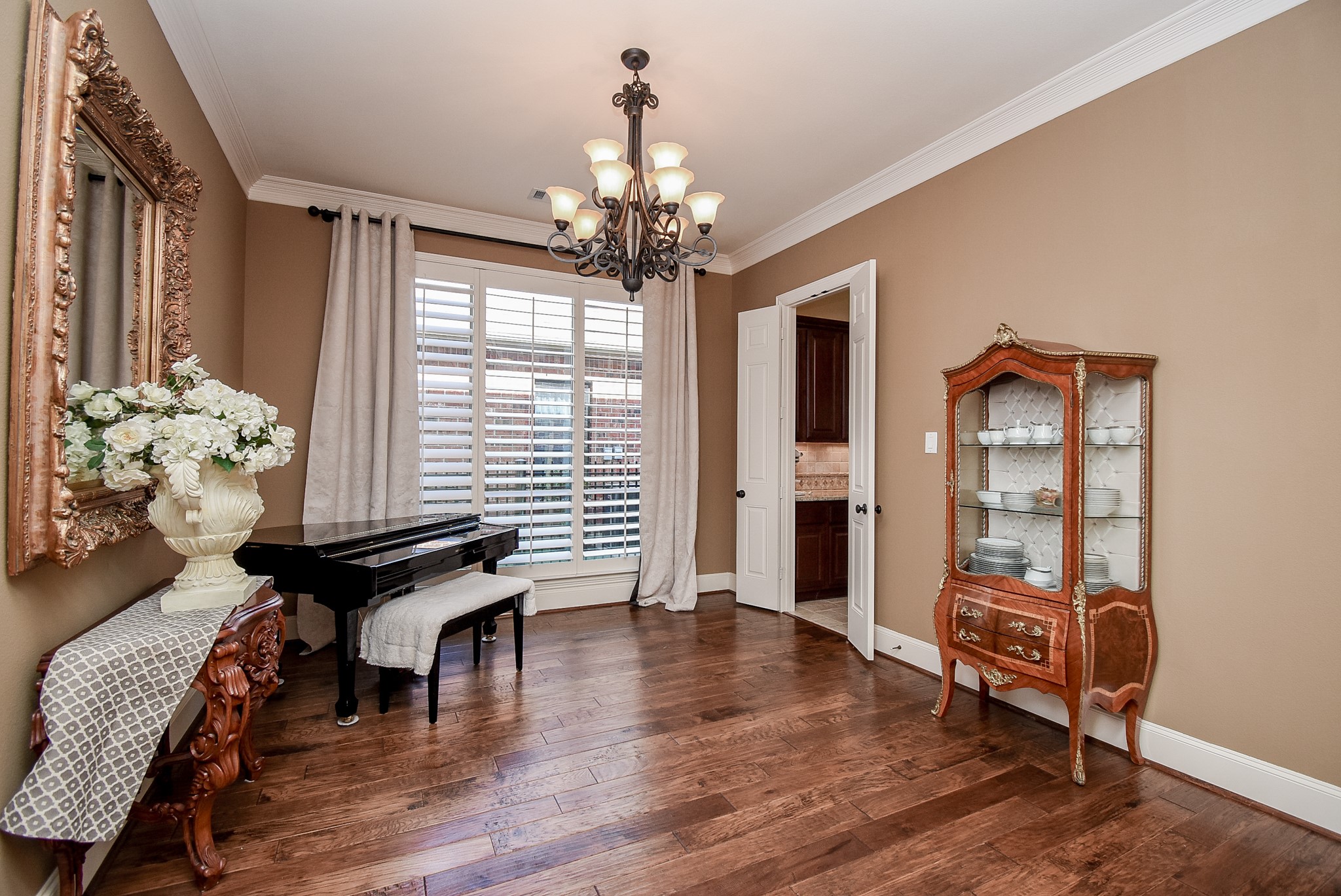 This view of the formal dining room showcases the great wall space and access to butlers pantry.