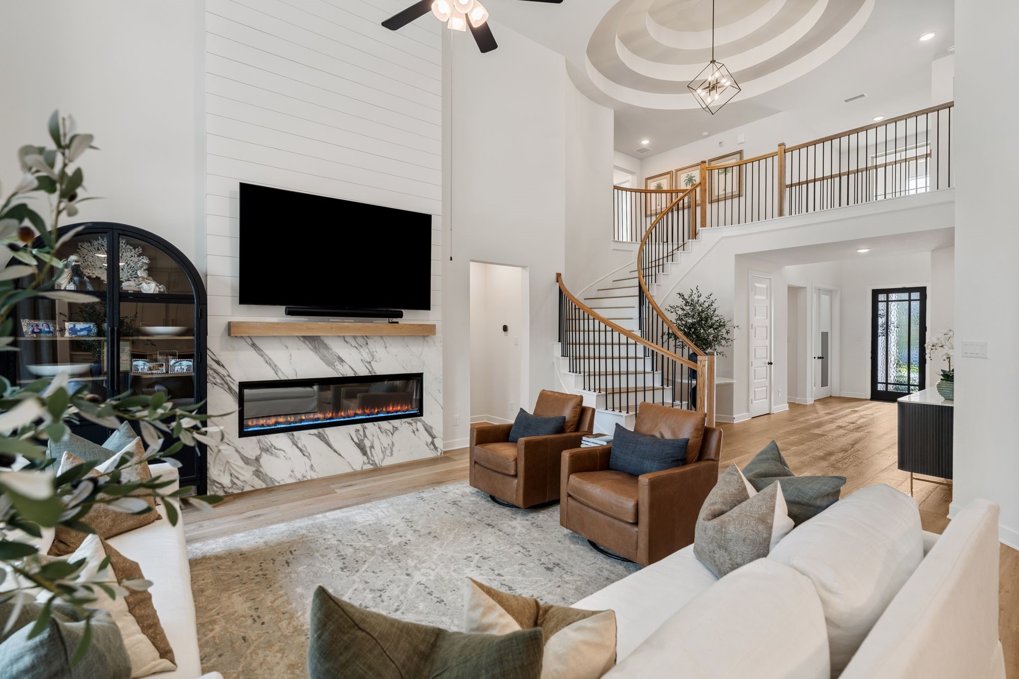 Designer finishes include the mable fireplace