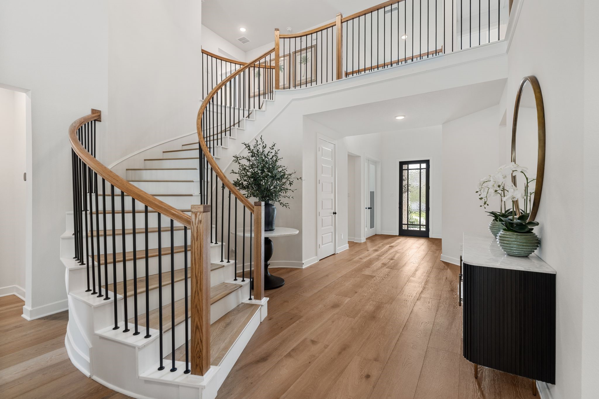 Luxury living showcasing over $300k in upgrades including 9" white oak floors!