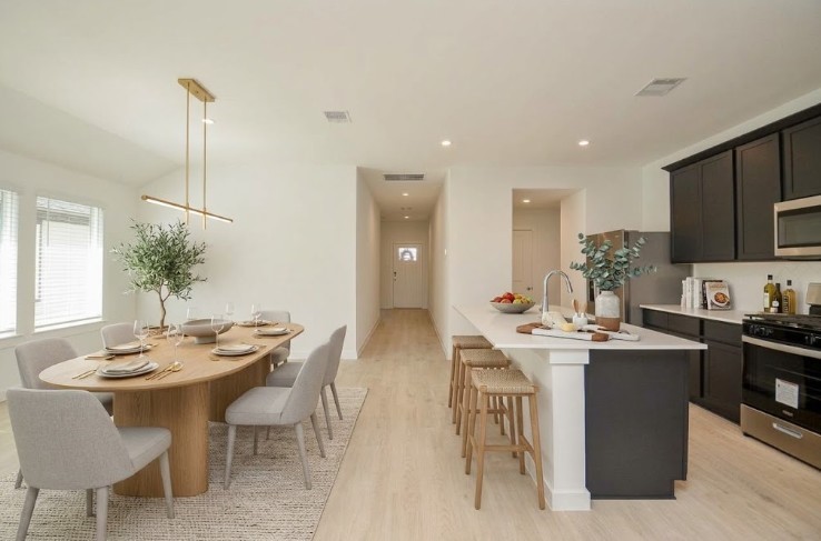 Virtually staged dining area and spacious kitchen