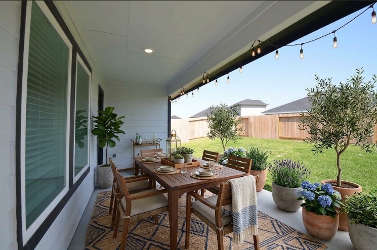 Relaxing covered back patio virtually staged to give you an idea