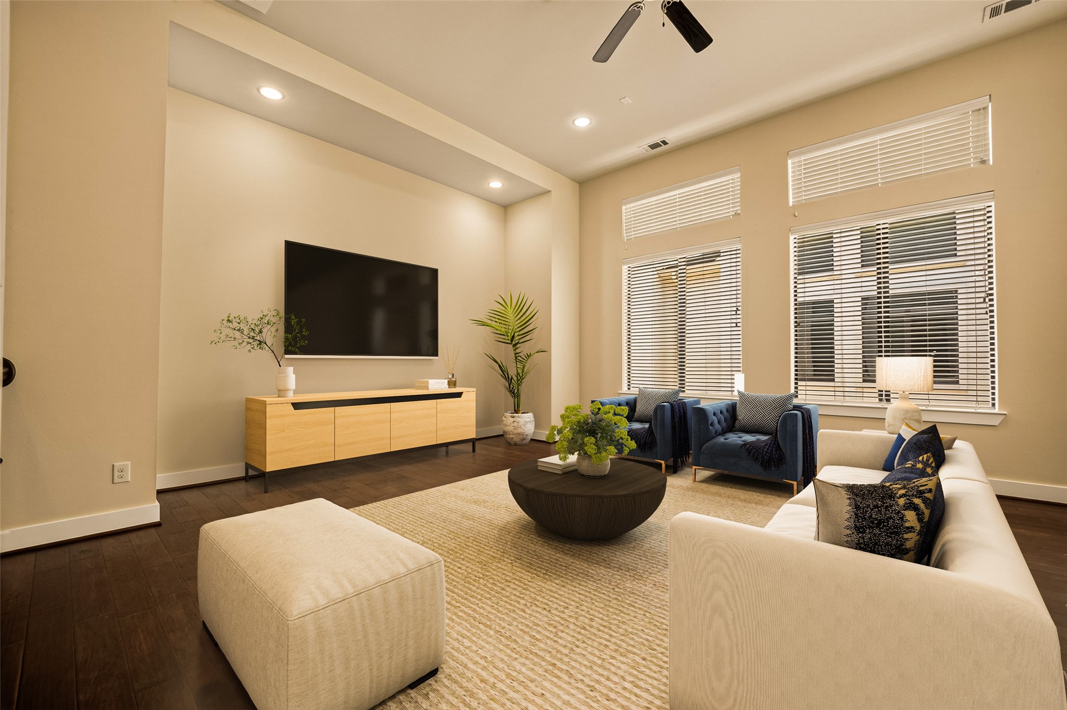 Virtually Staged. Spacious living room with large windows for natural light and sleek hardwood floors creating a warm, inviting atmosphere. Virtually Staged. Spacious living room with large windows for natural light and sleek hardwood floors creating a warm, inviting atmosphere.