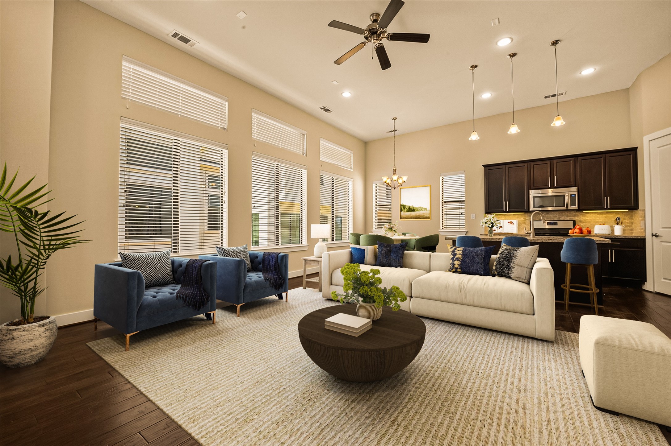 Spacious open-concept living area with high ceilings, abundant natural light, and elegant finishes, featuring a modern kitchen, and dining space.Virtually Staged. Spacious open-concept living area with high ceilings, abundant natural light, and elegant finishes, featuring a modern kitchen, and dining space.Virtually Staged.