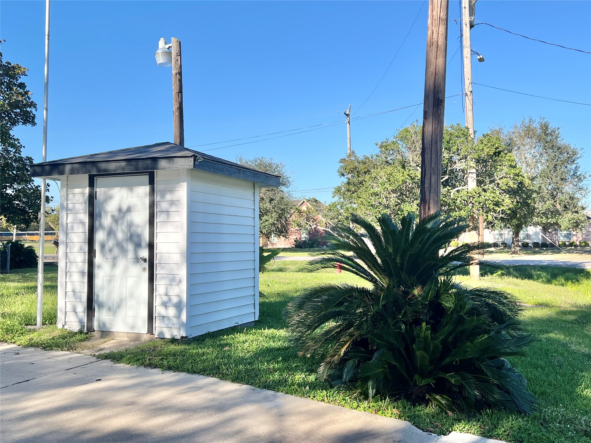 The well is in this little house here but since the home is now on "city services" for a while now, seller is not guarantying the well to be in working order, but you can probably get that going as well if you desire and can use it to water the Huge Mature Producing Pecan Trees all over this almost half-acre property.