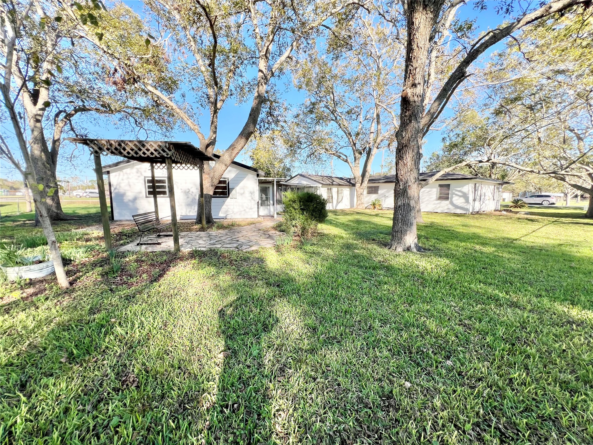 This is the back corner and you can easily put up swings and playground equipment for the kiddos here.   I mentioned Pecan Trees Earlier, here are about 5 of them!