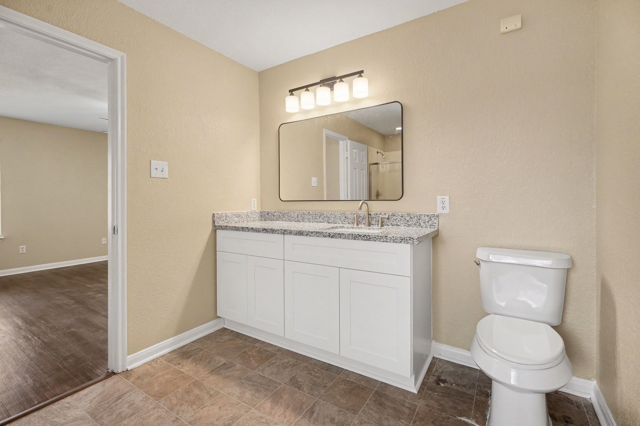 Primary Bathroom - Brand new vanity/countertop area and toilet