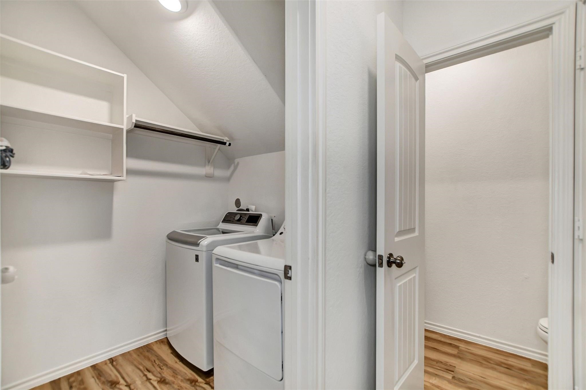 Laundry Room Across from the Garage. Washer and Dryer to Stay