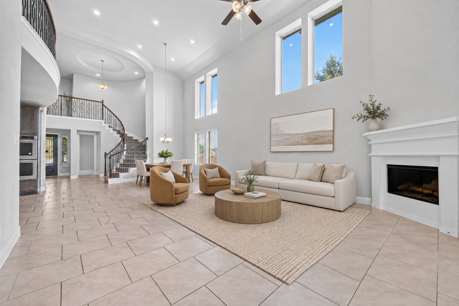 Huge living room/dining room space filled with natural light, open to the kitchen and leading to the back patio. (virtually staged for inspiration)