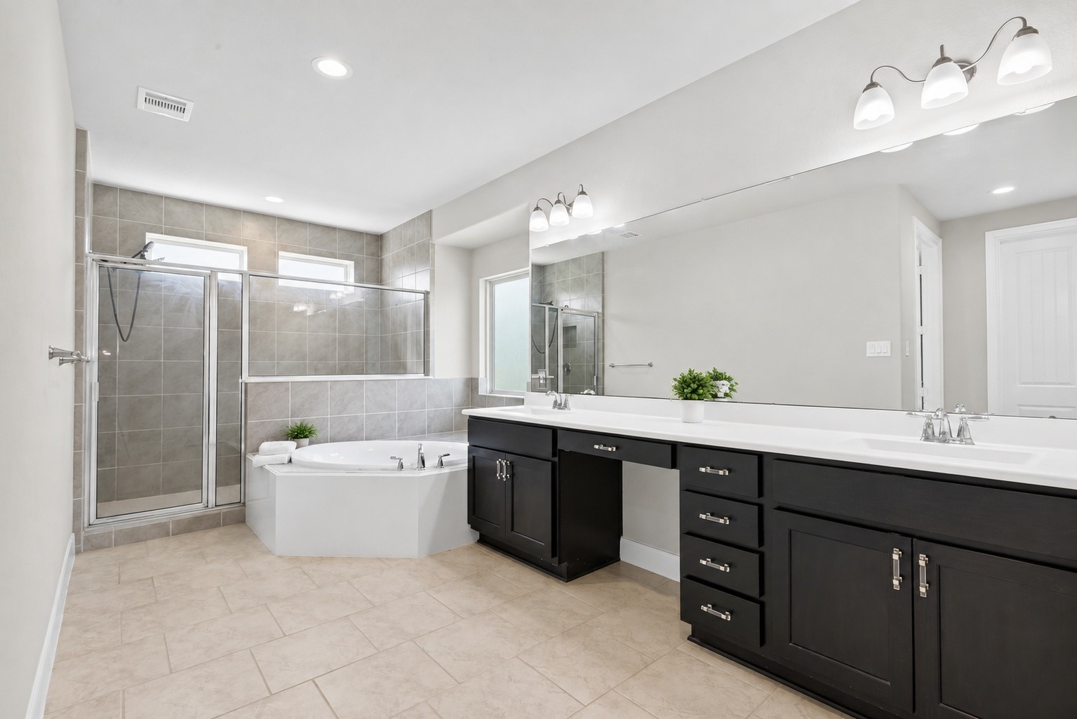 Primary bathroom does not disappoint. 2 walk-in closets, and space galore!