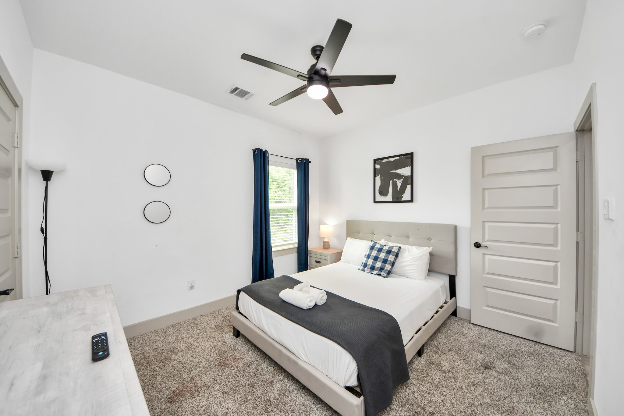 Well-sized secondary bedroom offering flexibility for residents, guests, a home office, or rental use.