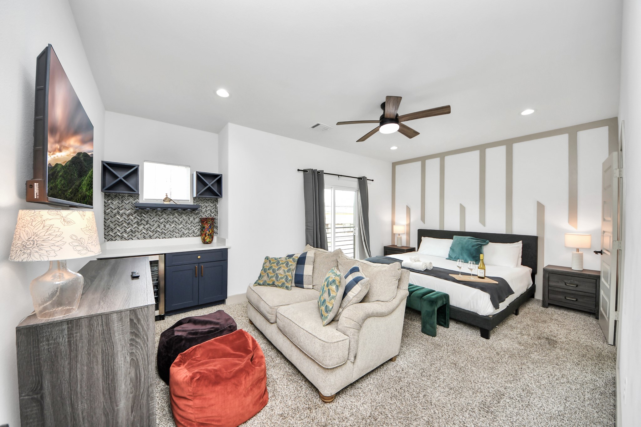 Spacious primary bedroom offering a comfortable private retreat in this modern 77091 duplex.
