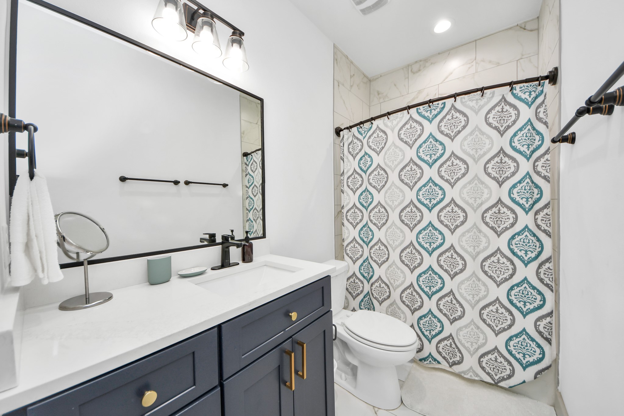 Modern bathroom with contemporary finishes designed for both style and everyday functionality.