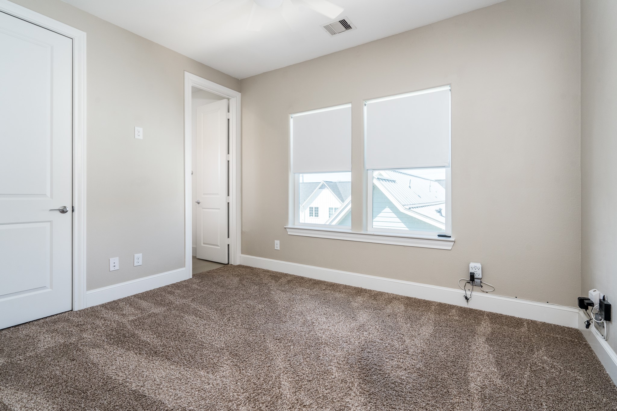 Secondary bedroom located on the third floor.