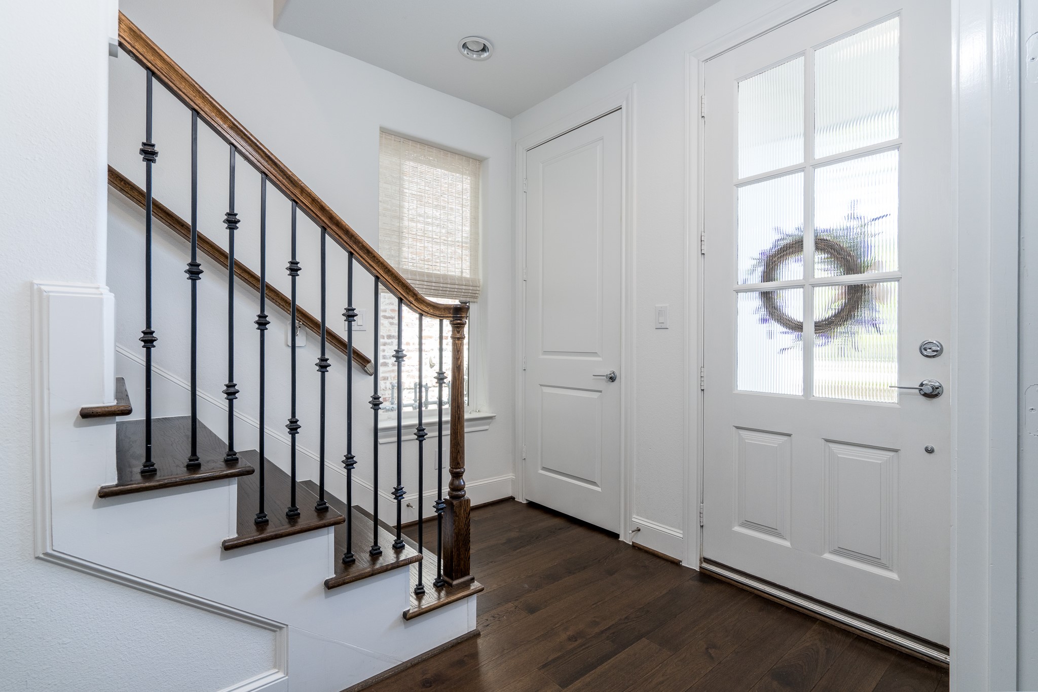 Step inside the bottom floor and notice the beautiful wood flooring