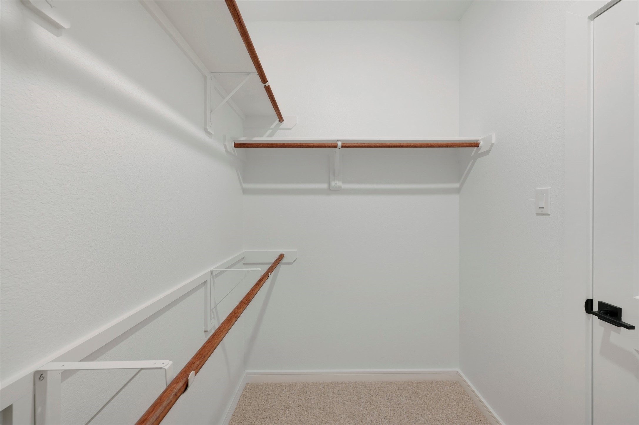 One of two walk-in closets in the primary suite