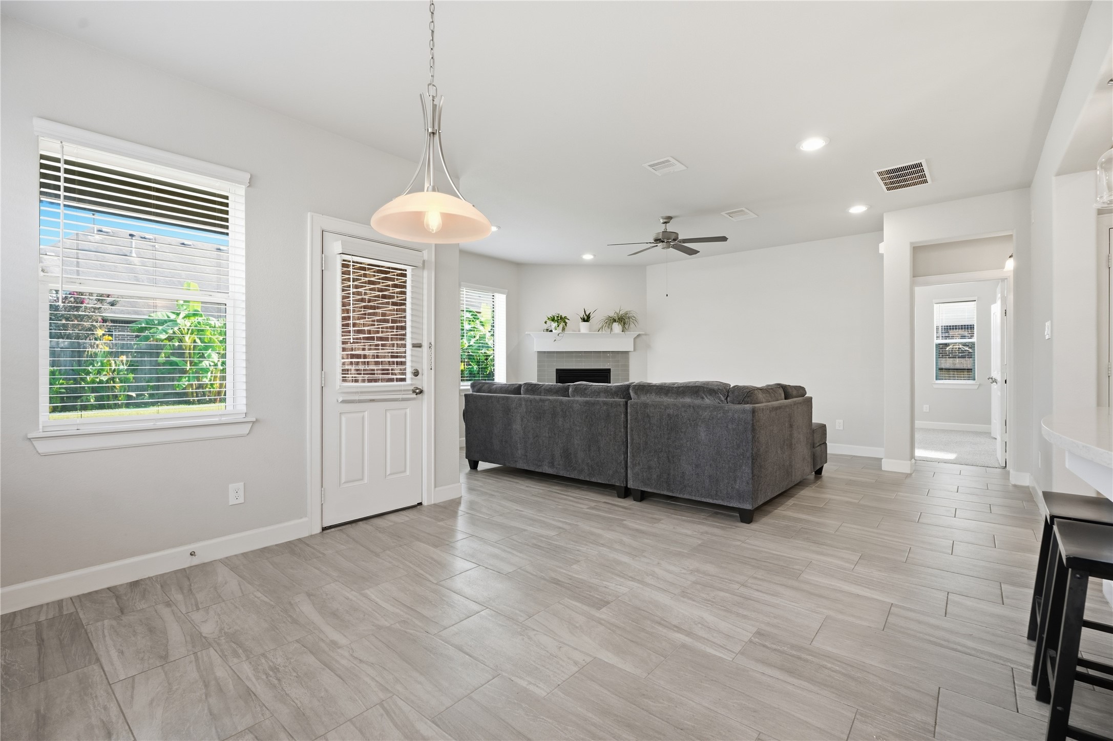 Open layout connects the breakfast area to the living room, creating an easy flow between the homes main gathering spaces.