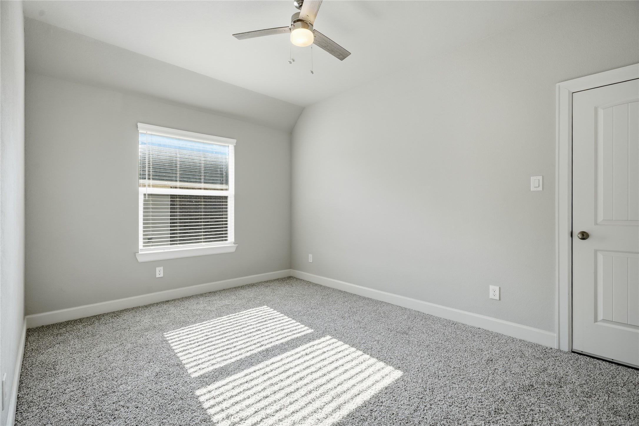 Generously sized upstairs bedroom with two closets providing plenty of storage and the added convenience of a private full bathroom.