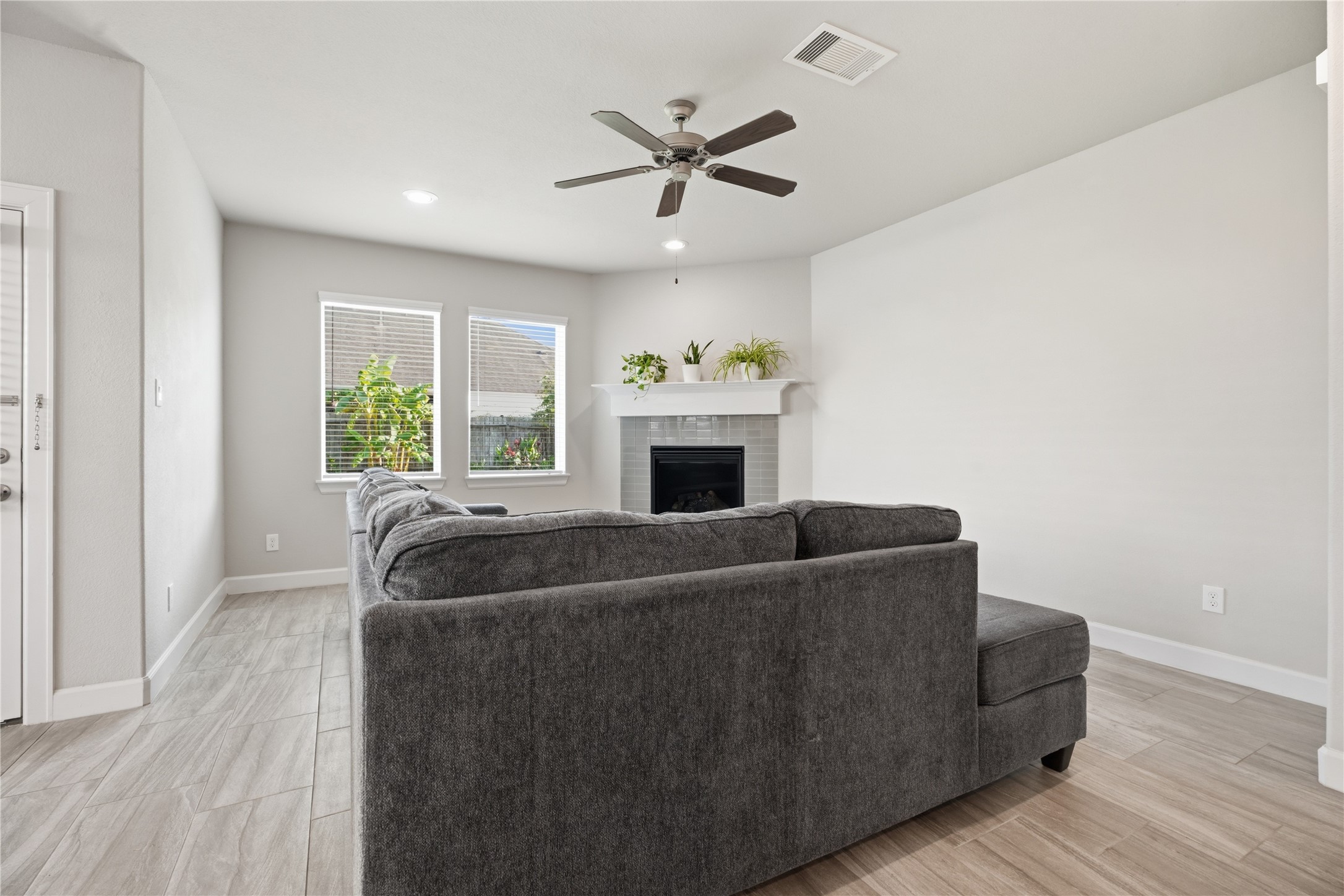 The open layout provides an easy flow between the living room and kitchen, ideal for entertaining while keeping everyone connected.