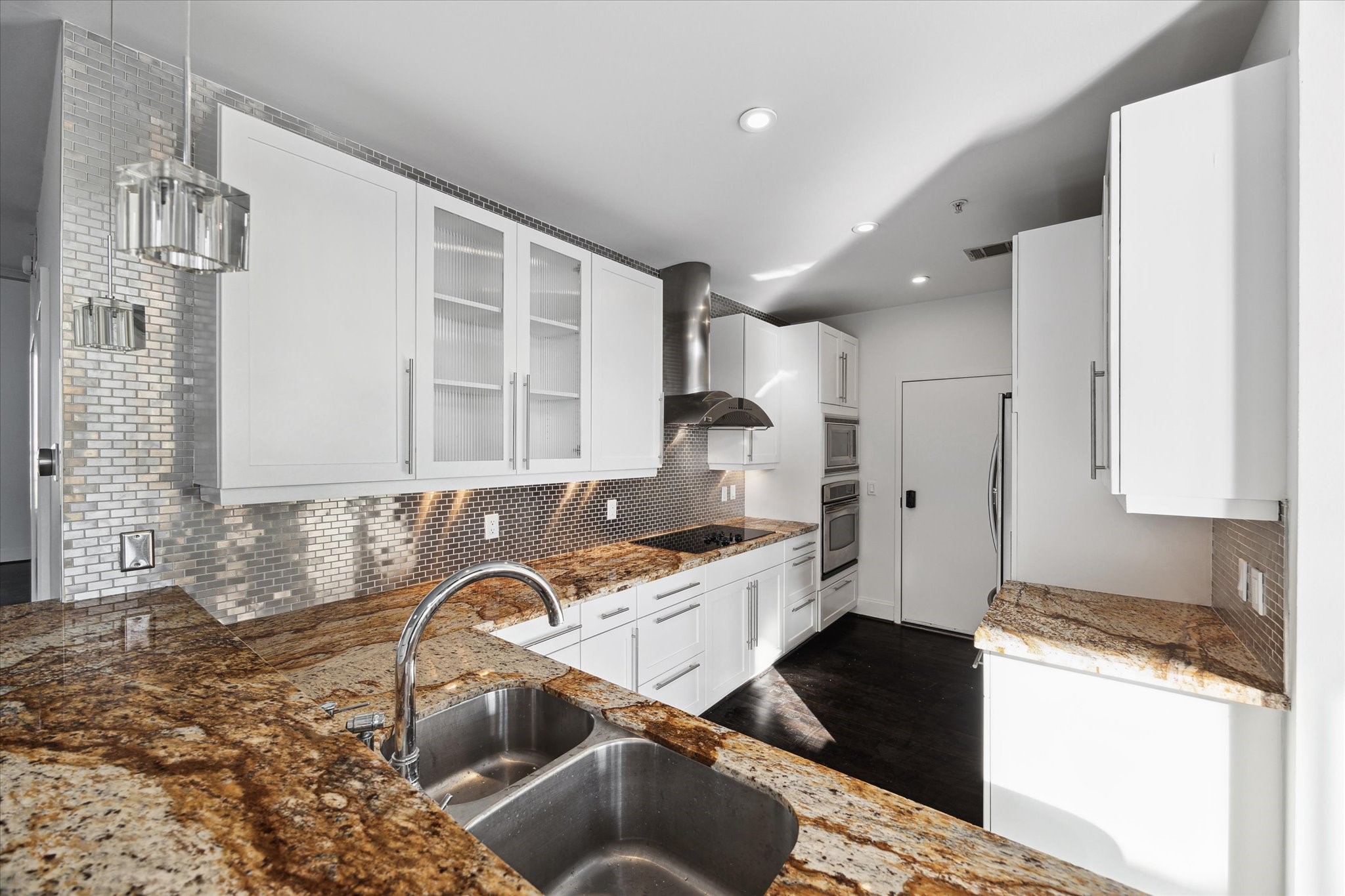 Open kitchen with lots of counter space.