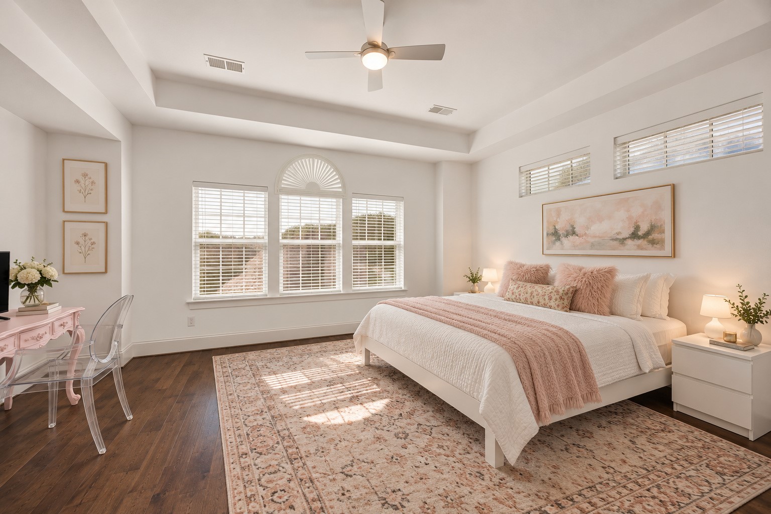 Gorgeous expansive 3rd floor primary suite offering a peaceful private retreat! Beautiful tray ceiling, ceiling fan & large windows w/ blinds enhance the spacious design. Generous proportions provide ample room for large bedroom furnishings. Enjoy the convenience of TWO walk-in closets & dreamy en suite bath featuring dual sinks, oversized soaking tub & separate shower. Virtually staged.