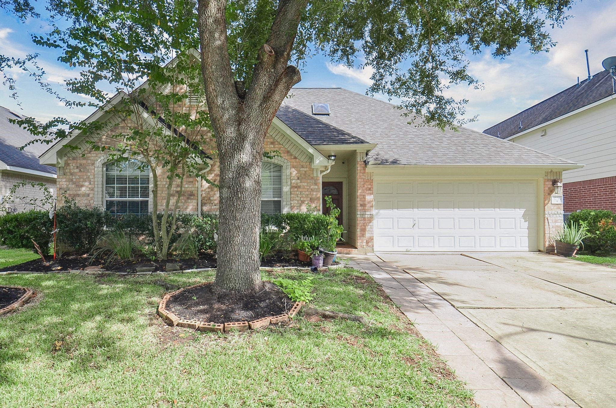 Charming curb appeal and a welcoming front yard define 3706 Cane Lake Dr, Richmond TX 77406, offering a perfect blend of comfort and style in a serene neighborhood setting.