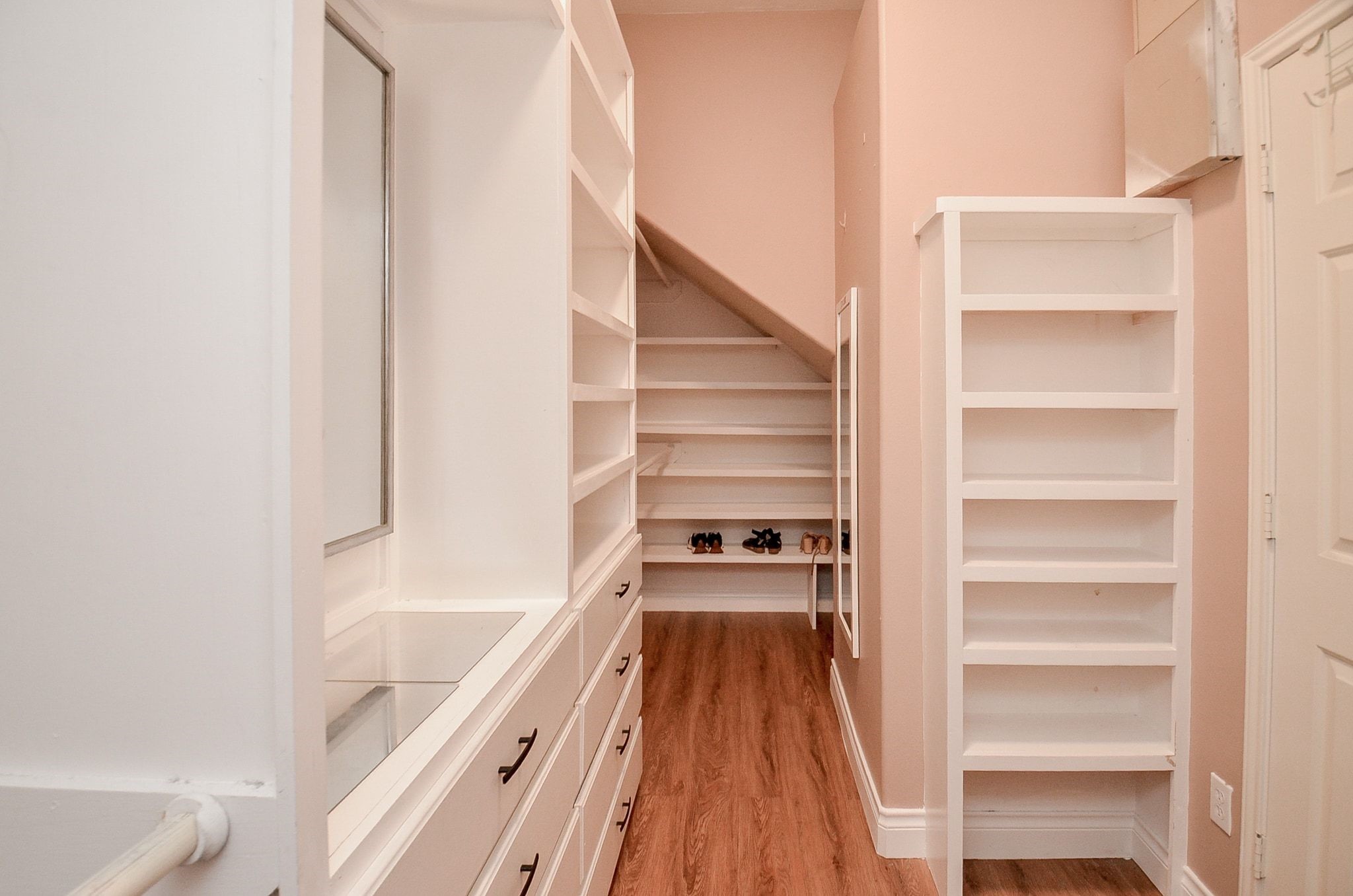 Huge customized primary bedroom closet