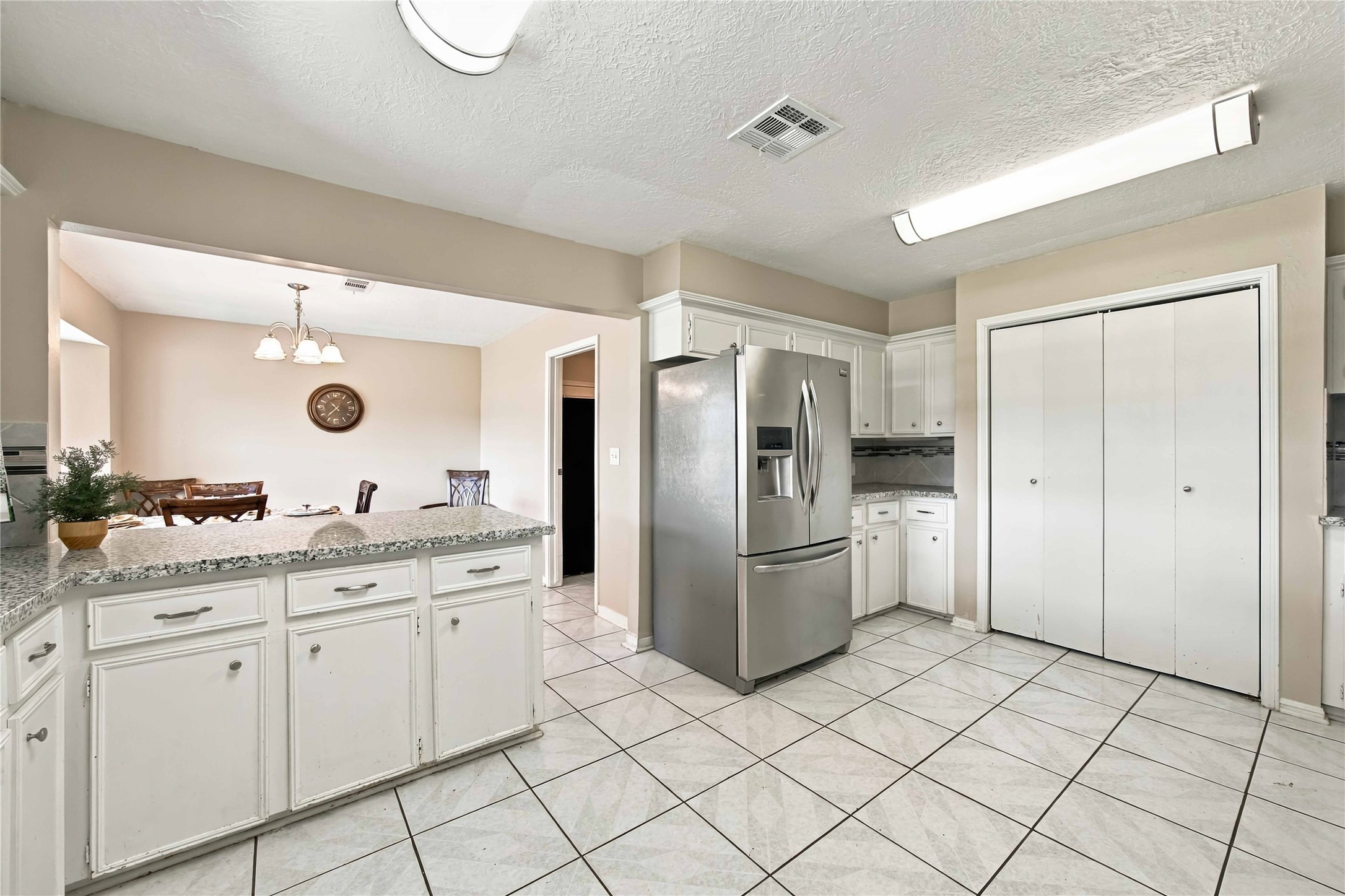 Open concept from the Kitchen toward the Dining room.