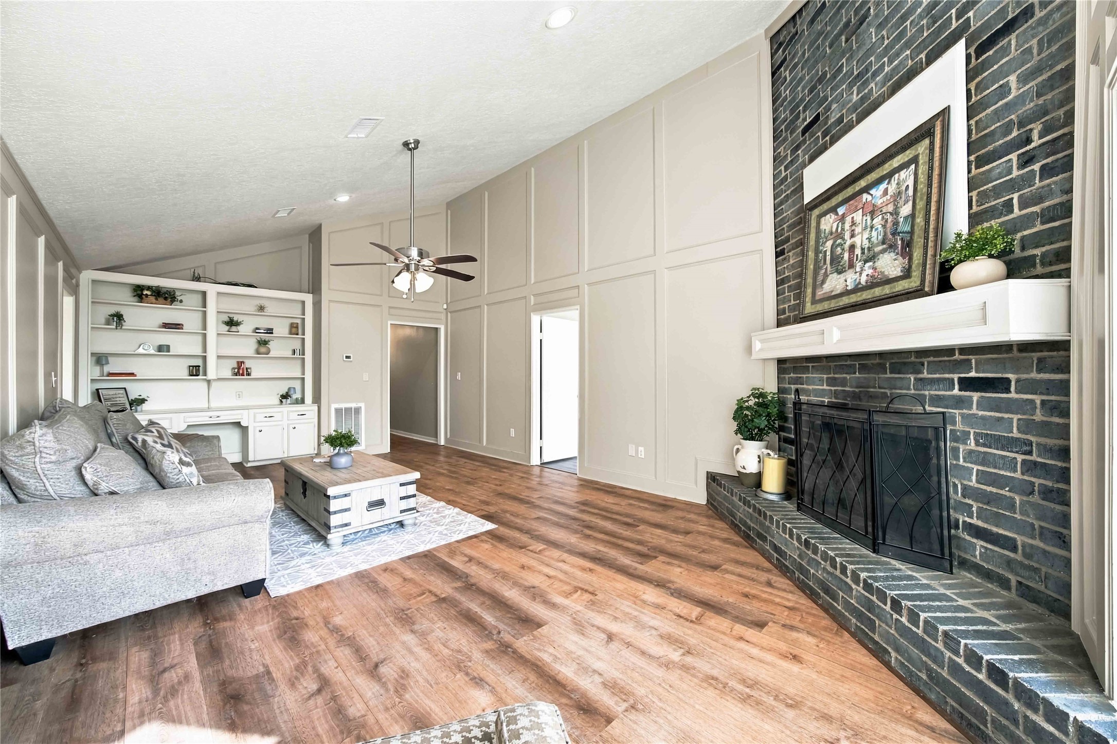 Angle from the hugh window into the Family room.