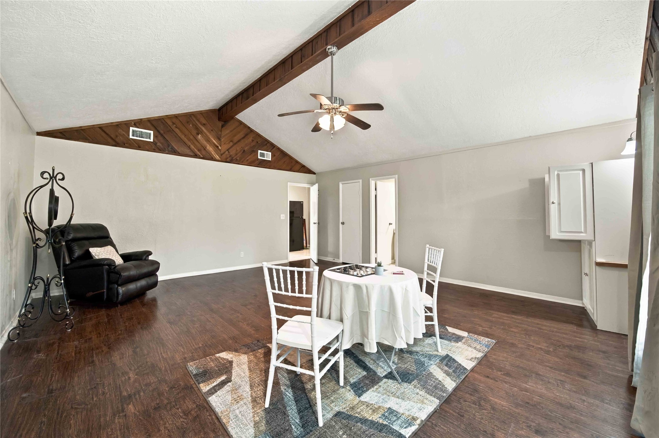 This Game room/ 5th bedroom has an en-suite bathroom. Beautiful Beam ceiling.