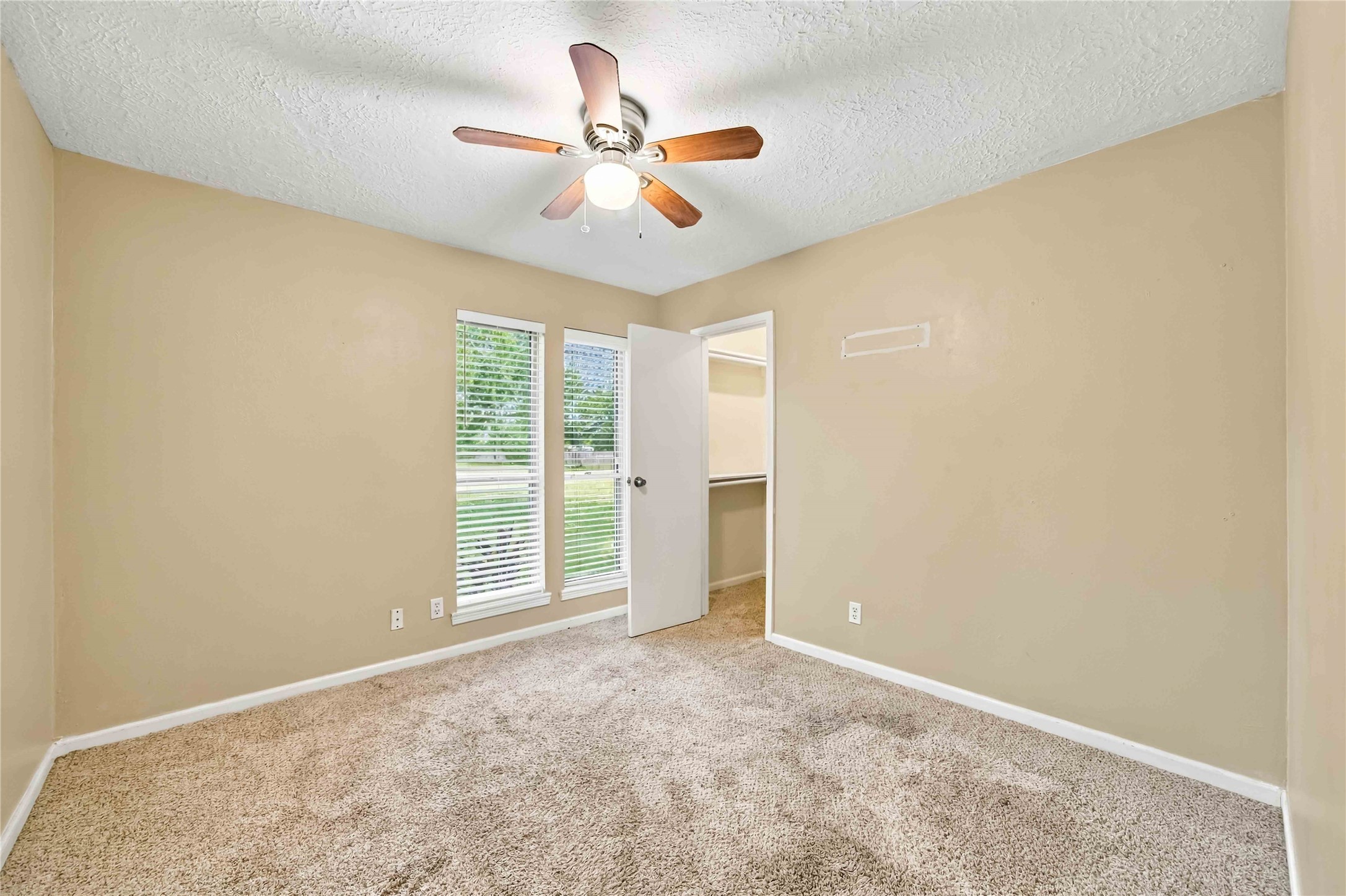 One of the 3 secondary bedroom. Walk-in closet.