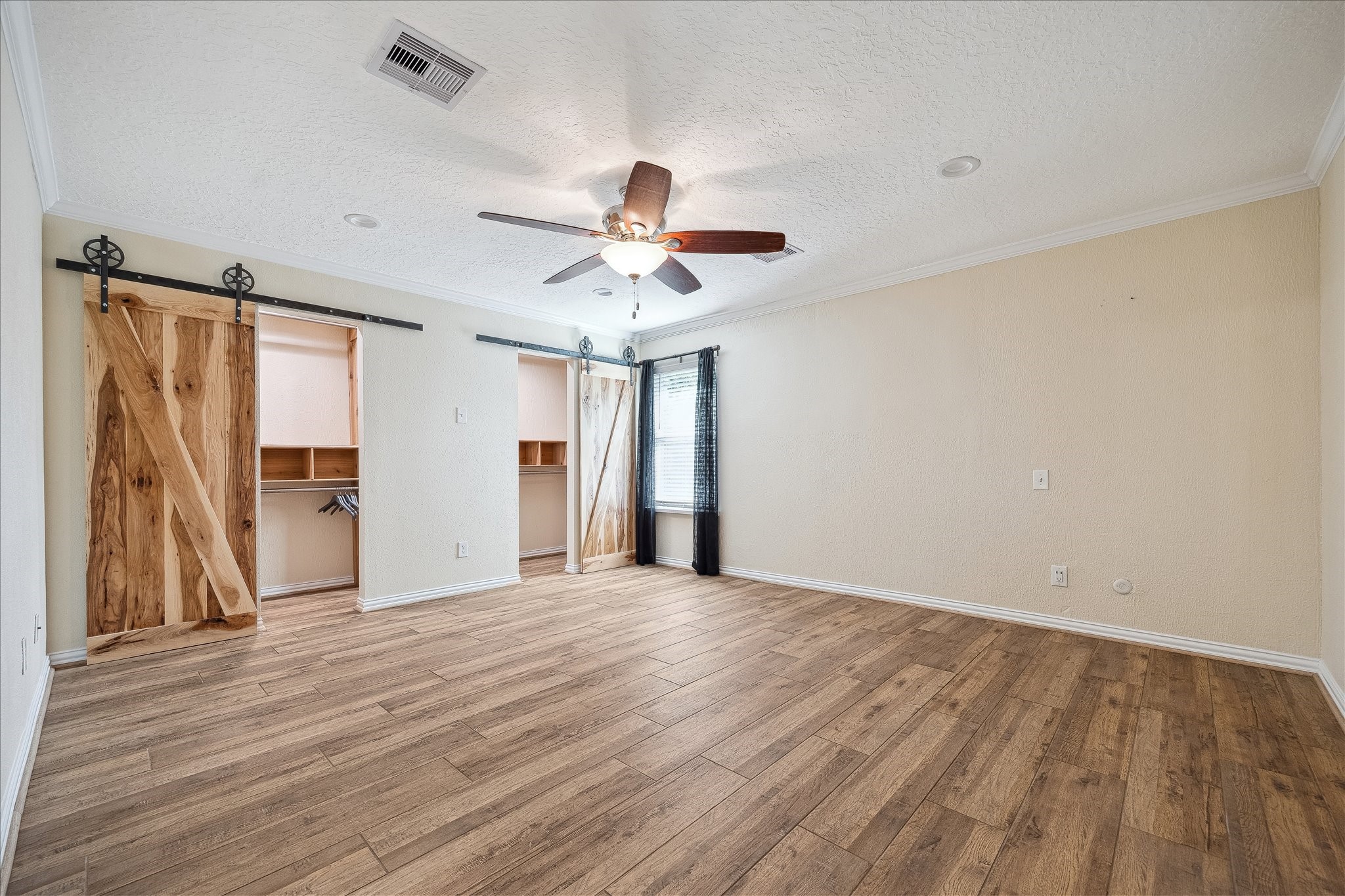 Large primary suite with double closets