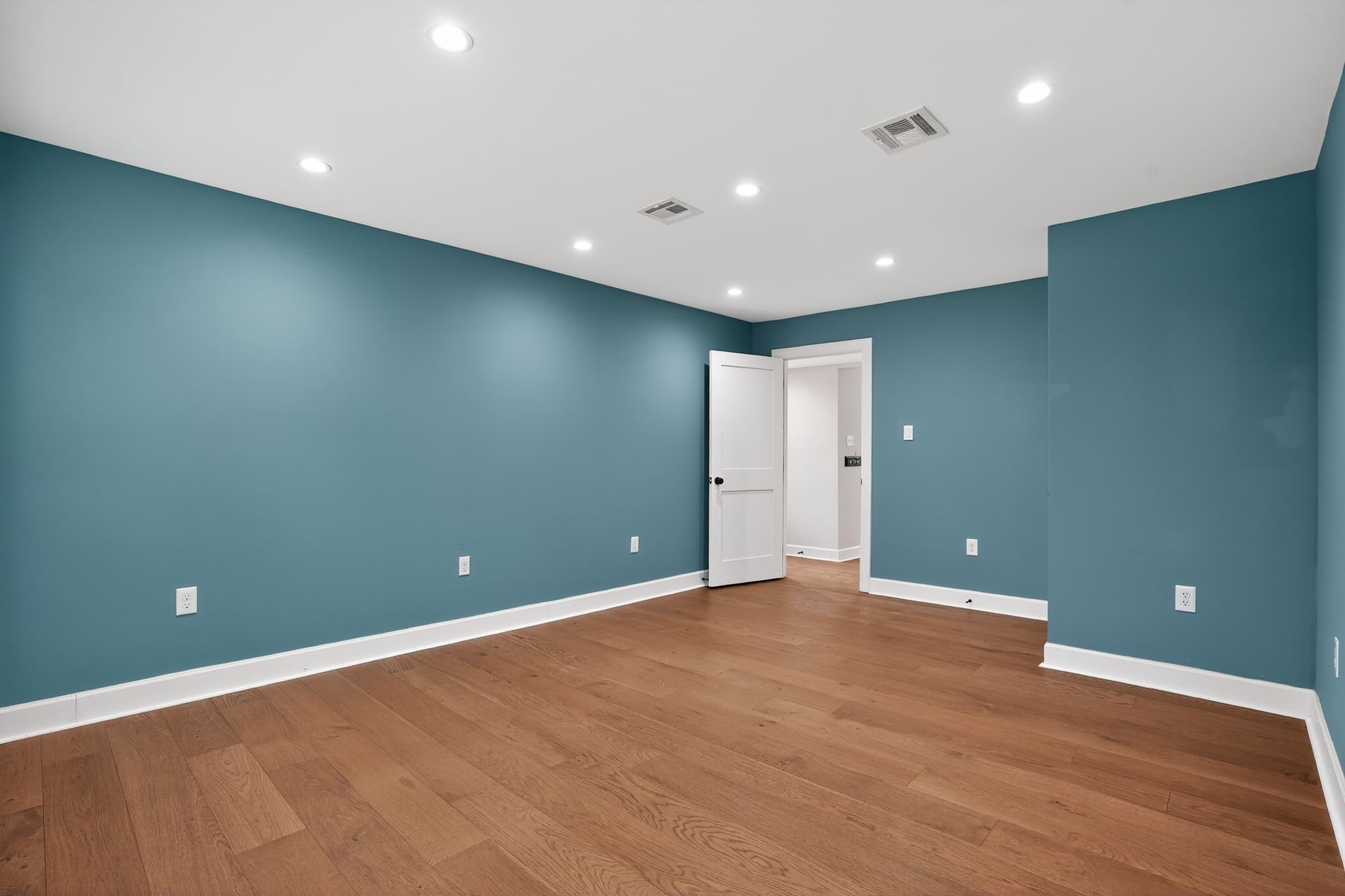large downstairs room, office, bedroom, or secondary living room with full closet