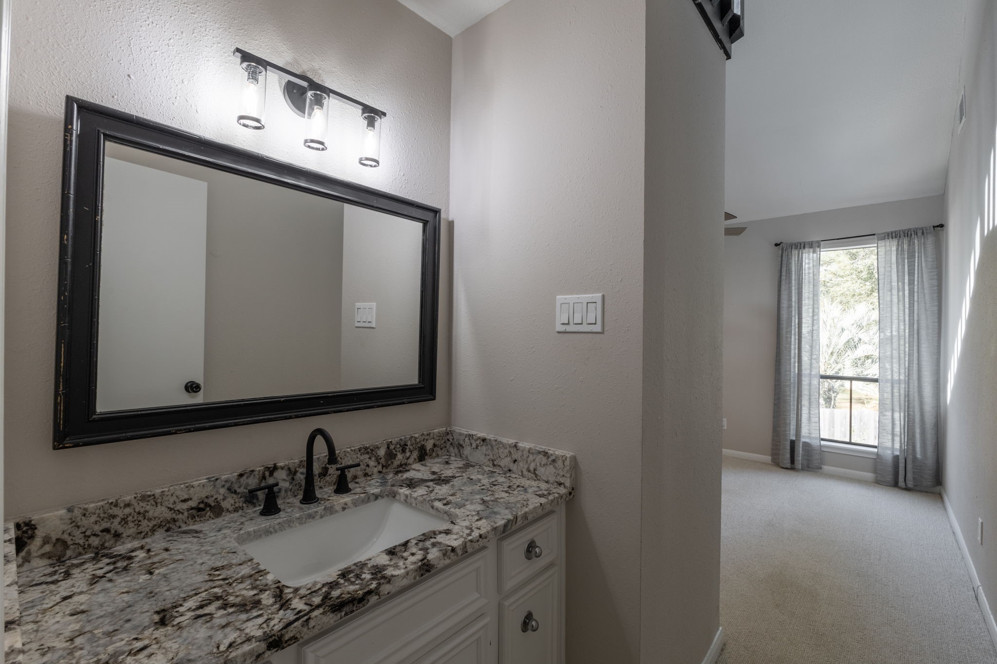 private vanity area in secondary bedroom