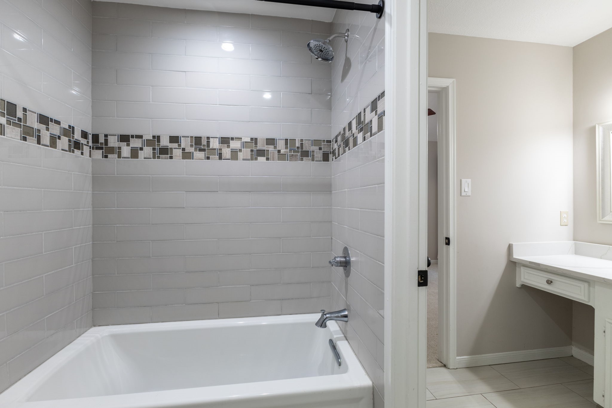 recently remodeled bathroom with large tub